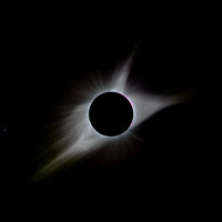 TSE near 3rd contact. Regulus is the bright star at the bottom left, and Nu Leo is the faint star in upper right.